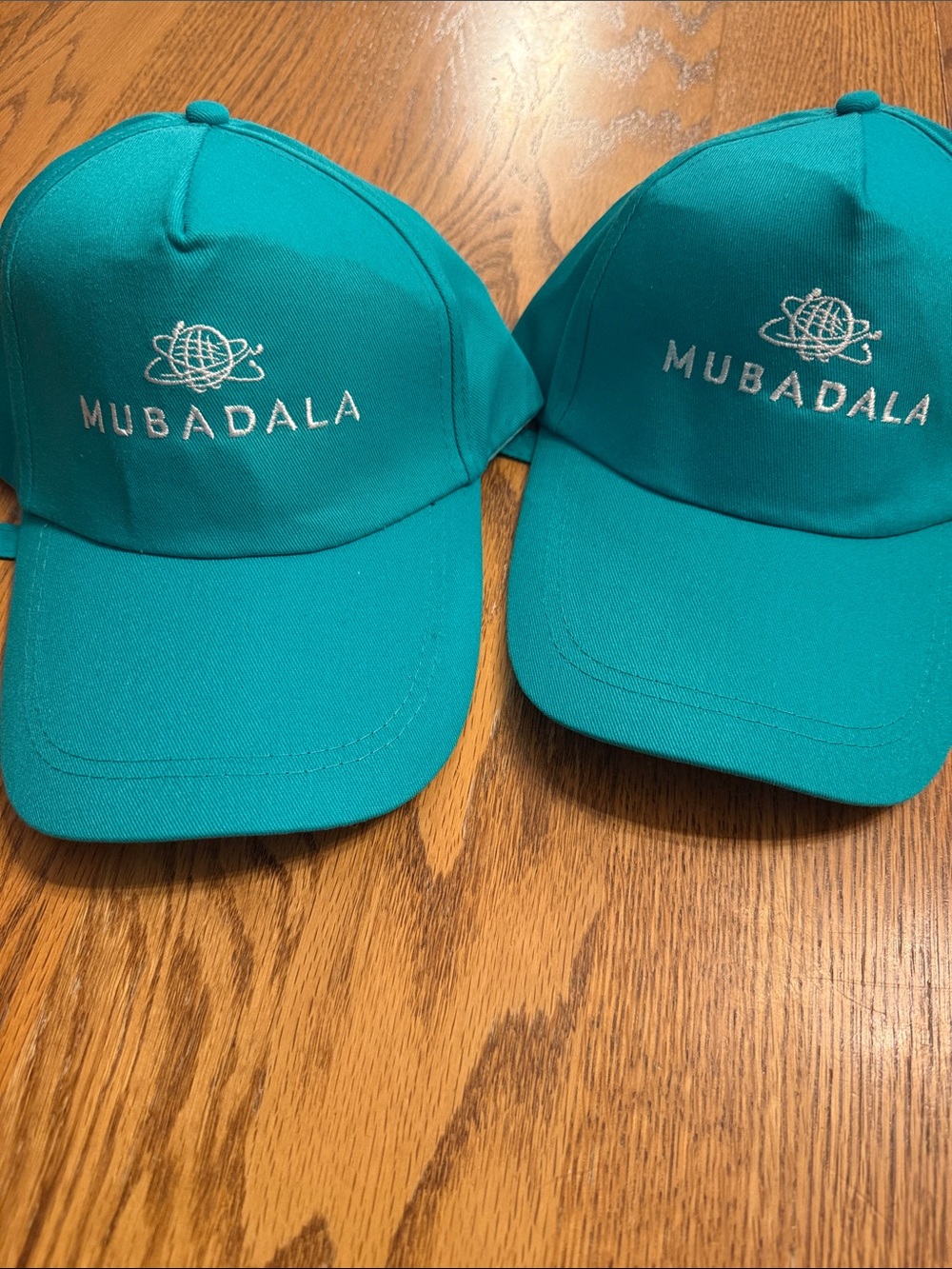 Teal colored baseball hats one size adjustable strap , set of 2